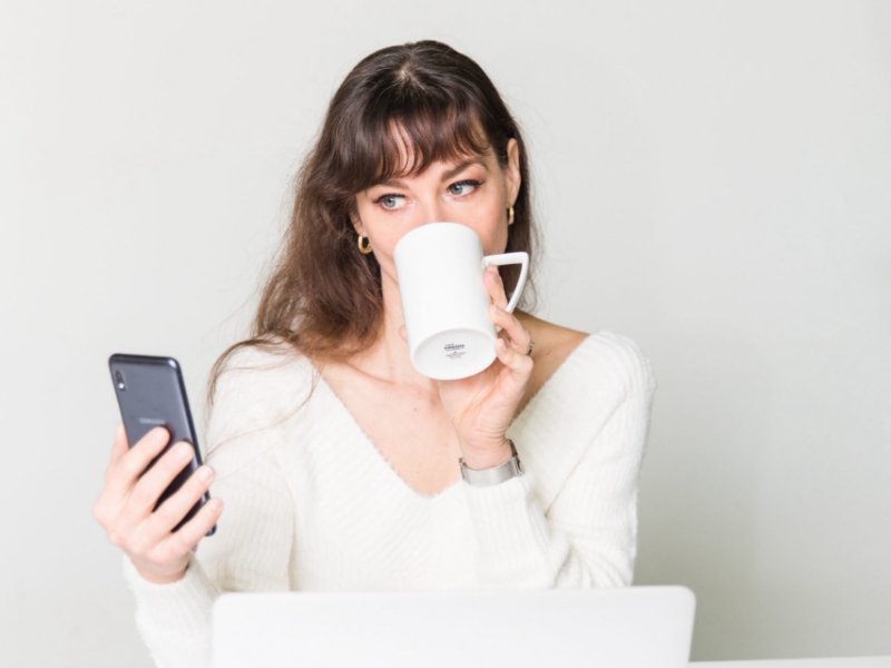 woman using social media on phone